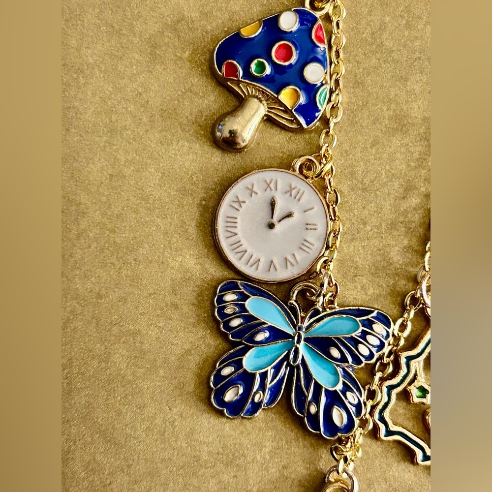 NWOT Necklace Alice in Wonderland, blue enamel charms rabbit, flower, cat… 21” - Picture 4 of 6
